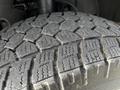 Close-up of a tire tread on a 2017 Mercedes-Benz Sprinter showing detailed patterns designed for grip and traction