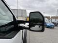 Close-up of the side mirror of a 2020 Ford F-550 showcasing its design and reflective surface