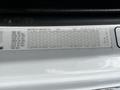 A 2012 Freightliner M2 106 vehicle axle weight specification label showing various load capacities for different axles