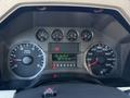 2008 Ford F-550 dashboard with speedometer fuel gauge and odometer displaying 104708.8 kilometers