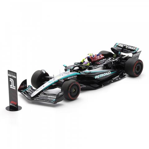 A detailed model of a Spark Mercedes F1 W15 car featuring the #44 Lewis Hamilton livery with a display stand marked for the 2024 British Grand Prix