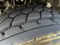 Close-up of a tire tread from a 2012 Freightliner M2 112 showing detailed grooves and patterns designed for traction and stability