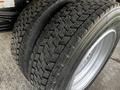 Close-up of the dual rear tires of a 2019 Hino 195 showing detailed tread pattern and shiny aluminum rims
