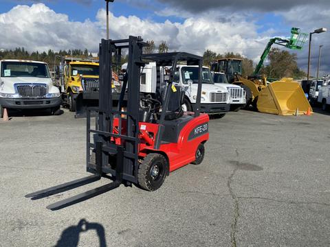 A red and black 2024 AGT KFE20 forklift with two long forks positioned at the front ready for lifting tasks