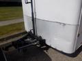 A 2004 Royal 18 Foot Office Trailer with a white exterior and a diamond plate metal lower section