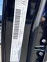 A 2019 Dodge Charger door tag displaying vehicle information and specifications