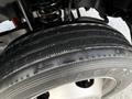 Close-up of a tire from a 2017 Ford F-450 Super Duty showcasing tread patterns and branding on the sidewall