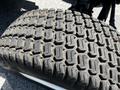 Close-up of the tire tread of a 2018 New Holland Boomer 45 showing a hexagonal pattern and signs of wear