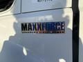 The image shows a metallic badge reading MAXXFORCE ADVANCED DIESEL POWER attached to a vehicle door