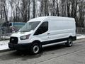 A white 2021 Ford Transit van parked on a pavement with a plain exterior and black accents