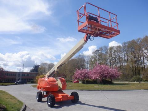 2008 JLG Boom Lift with orange basket raised on a beige arm and four large wheels