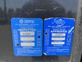 Two blue inspection and safety stickers with details about a propane system for a 2008 Newmar Canyon Star 36 Foot Class A Motorhome