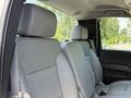 Interior view of a 2016 Chevrolet Silverado 2500HD showing gray leather seats with headrests