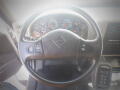 Steering wheel of a 2016 International WorkStar 7500 with various dials and controls visible on the dashboard