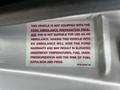 A label on a 2004 Ford Econoline stating it is not equipped with the Ford Ambulance Preparation Package and warning against modifications for safety reasons