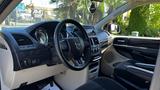 Interior view of a 2016 Dodge Grand Caravan showcasing the steering wheel dashboard and control panel