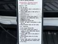 A 2022 Ford Transit with a detailed lift operation instruction label featuring steps for deploying and stowing the lift for wheelchair access