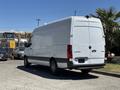 A white 2019 Mercedes-Benz Sprinter van with a high roof and rear doors facing the viewer
