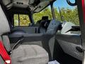 Interior view of a 2006 Emergency One Fire Truck showing a driver's seat dashboard and equipment panel