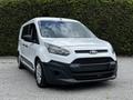 A white 2016 Ford Transit Connect with a black front bumper and distinctive grille design is parked in the foreground