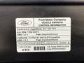 2011 Ford Econoline vehicle emission control information label displaying compliance and fuel type details