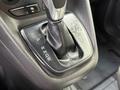 Close-up of the gear shift lever of a 2017 Ford Transit Connect showing the gear positions P R N D S