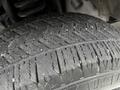 Close-up of a tire tread from a 2017 Ford F-250 showing deep grooves and patterns for traction