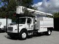 A 2012 Freightliner M2 106 bucket truck with a raised boom and white body featuring a storage compartment on the side
