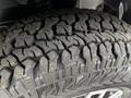 Close-up of a 2020 Mercedes-Benz Sprinter tire showcasing its rugged tread pattern designed for enhanced grip and durability
