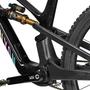 A 2025 Canyon Spectral:ONfly CF LTD mountain bike featuring a black frame with a speckled finish an integrated motor and unique suspension design with gold and black shock absorbers