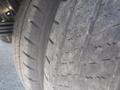 Close-up of a tire from a 2016 Ford Transit showcasing the tread pattern and rubber surface