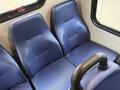 Blue vinyl bench seats inside a 2020 Chevrolet Express van