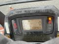 The dashboard display of a 2015 Kubota F3990 showing operational metrics with indicators for engine temperature speed and maintenance hours
