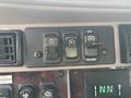 Control panel featuring three switches for lights and cruise control functions in a 2013 Kenworth T370