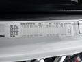 A label from a 2006 Freightliner M2 112 detailing axle specifications and tire sizes