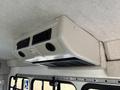 Interior ceiling ventilation system of a 2016 Ford Econoline with vents and a control panel