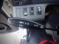 A black multifunction control stalk for a 2013 Hino 308 with settings for lights wipers and turn signals