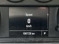 A digital speedometer display showing a speed of 0 km/h and a total distance of 106729 km on a 2021 Chevrolet Silverado 1500