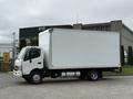 A white 2018 Hino 195 box truck featuring a large cargo area with a low cab and a streamlined design