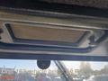 A 2010 Kubota F3680 tractor interior view showing the roof with a fabric panel and a circular light fixture