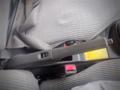 Interior view of a 2003 Toyota Toyoace showing the seatbelt and seat adjustment lever on the front seat