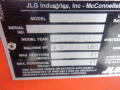 A label from a 2008 JLG Boom Lift displaying information such as model, serial number, machine weight, platform height, and horizontal reach