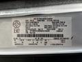 2022 Ford Transit with a vehicle information label detailing specifications and manufacturing information
