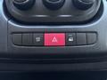 Control panel of a 2016 RAM Promaster featuring various buttons including an ESC off button a hazard light button and a door unlock button