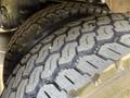 Close-up of a 2017 International 4300 truck's dual rear tires showcasing detailed tread patterns and rubber surface