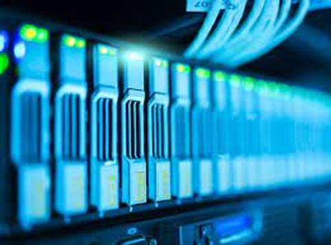 Close-up of multiple server units with glowing LED indicators indicating active status in a data center