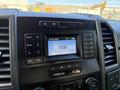 Dashboard of a 2020 Ford F-550 displaying a digital clock and media controls