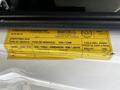 A yellow label detailing specifications for a 2019 Ford Econoline including vehicle type and tire dimensions
