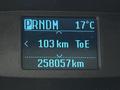 Display screen showing gear selection PRNDM along with temperature 17°C distance to empty 103 km and total distance 258057 km of a 2015 Ford Transit