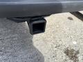 A receiver hitch attachment for a 2018 Ford F-150 designed for towing or transporting accessories